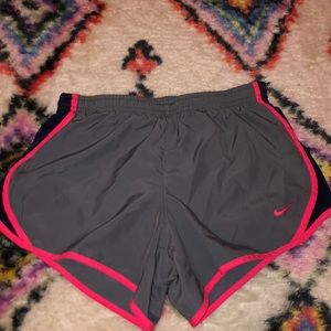 Grey and dark blue girls Nike running shorts